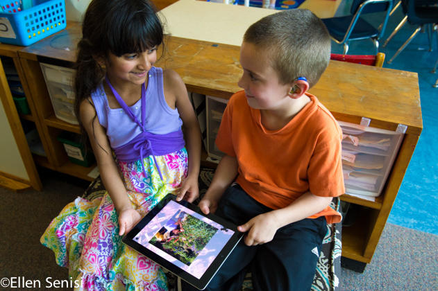 Children using an iPad