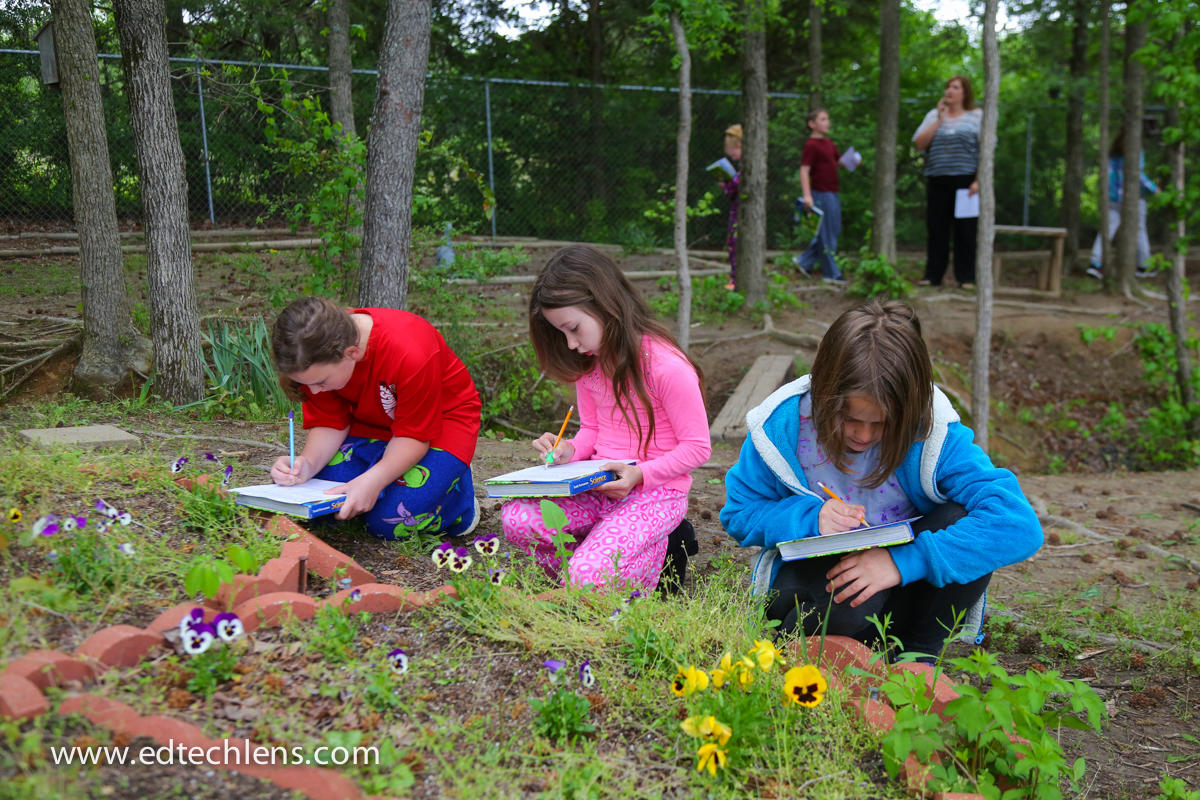 Citizen Science in K-5 Classroom Elementary school students writing observations plants