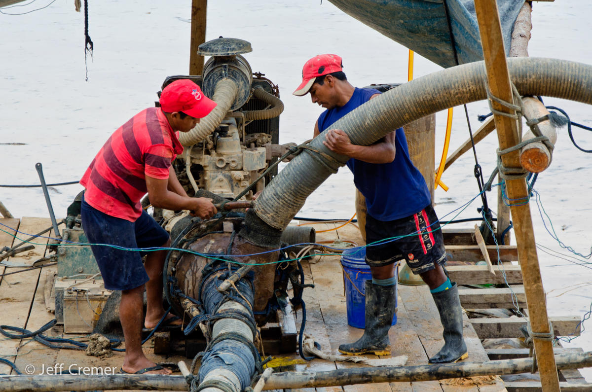 These miners are working to separate gold from the dirt. (Image by Jeff Cremer) Gold Mining Rainforest Peru EdTechLens