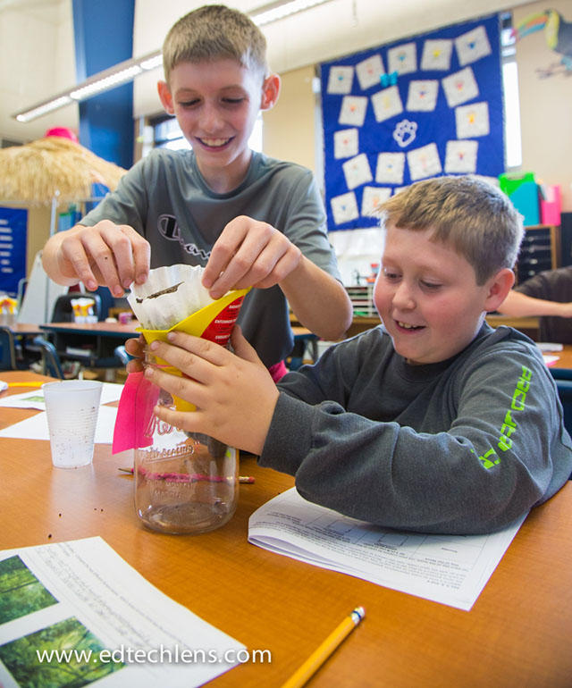 Students at work during field testing of Rainforest Journey hands-on activities Elementary students working on science activity